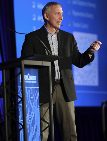 A speaker in a Conference Session