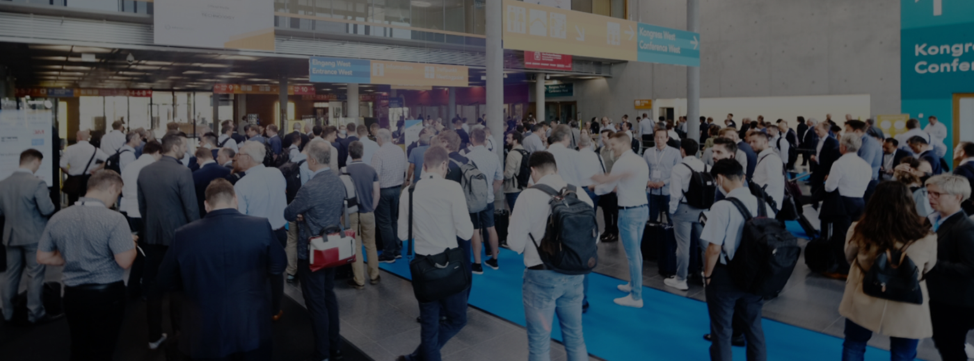 People are waiting inline for entering the event expo floor
